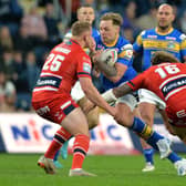 Blake Austin, pictured taking on Hull KR's Greg Richards and Kobin Sims, could reutrn for Rhinos this week after fiove games on the injury list. Picture by Bruce Rollinson.