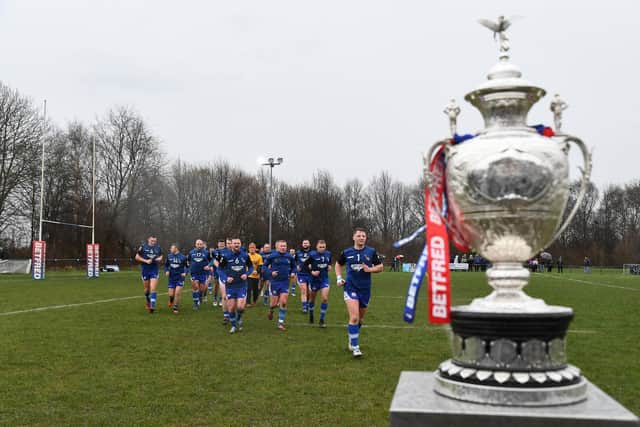 Lock Lane warm up ahead of their home Challenge Cup tie against Rochdale Hornets three years ago. Picture by Will Palmer/SWpix.com.