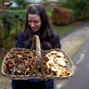 Lisa Cutcliffe, 42, spends up to 15 hours a week 'shopping' in nature in Leeds fields and forests. She's pictured here with foraged mushrooms. (Photo Lisa Cutcliffe/SWNS)