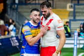 Leeds Rhinos' Jake Connor is consoled by Alex Walmsley, of St Helens, after last year's elimination play-off. Picture by Allan McKenzie/SWpix.com.