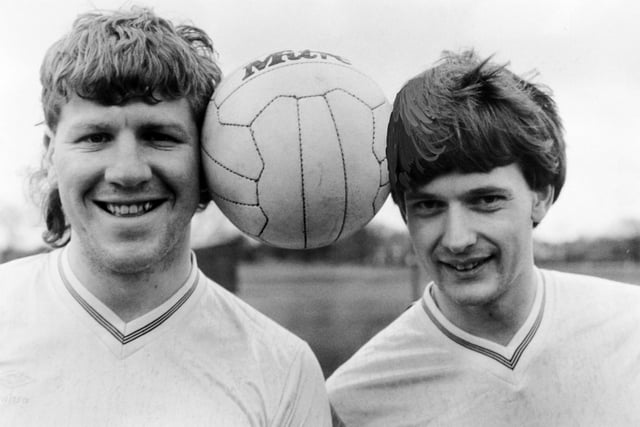 When it came to getting their heads together, Clive Smith (left) and Jerry Reynolds added up to a formidable scoring duo. They form the strike force at Midland bank, currently second in the Leeds Sunday Combination League Division Two and who have reached the quarter final of the Luty  Cup and the semi-finals of the Leeds and District Senior Cup. The success reflected the scoring ability of Jerry, who hit 32 goals this term and Clive, who has 22 to his credit. The pair need eight goals between them to bring their joint tally to 200 in two and a half seasons. Pictured in January 1987.