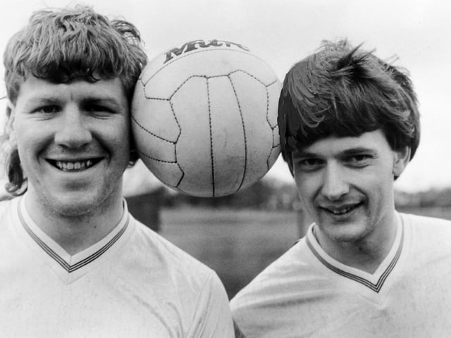 When it came to getting their heads together, Clive Smith (left) and Jerry Reynolds added up to a formidable scoring duo. They form the strike force at Midland bank, currently second in the Leeds Sunday Combination League Division Two and who have reached the quarter final of the Luty  Cup and the semi-finals of the Leeds and District Senior Cup. The success reflected the scoring ability of Jerry, who hit 32 goals this term and Clive, who has 22 to his credit. The pair need eight goals between them to bring their joint tally to 200 in two and a half seasons. Pictured in January 1987.