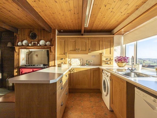 A kitchen with a view: look out over the Calder Valley for miles from this kitchen window.