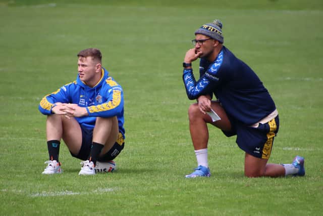 Chev Walker, right, with Rhinos player Harry Newman.
