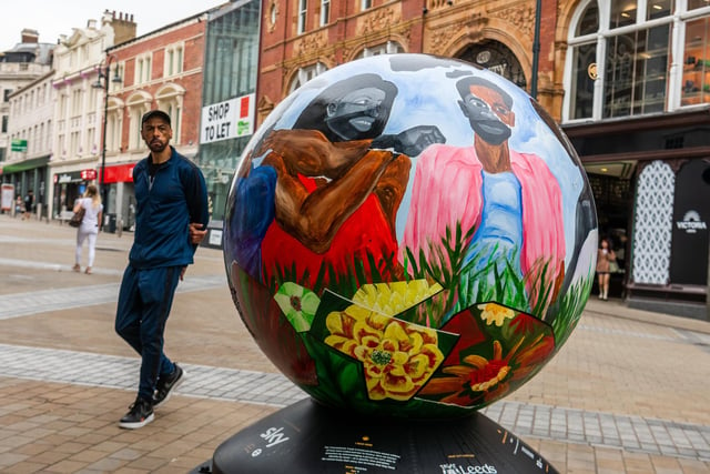 This globe is to serve as a reminder of the fight to be free, how long it has taken, and the need to defend what has been attained so far. Artist Larry Amponsah is a multimedia artist who enjoys the political aspect of imagery and creation.