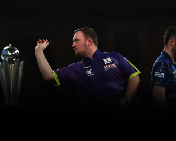 Crossing paths: Luke Littler, left, and Luke Humphries, right, in last year's PDC World Darts Championship final (Picture: Tom Dulat/Getty Images)