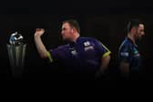 Crossing paths: Luke Littler, left, and Luke Humphries, right, in last year's PDC World Darts Championship final (Picture: Tom Dulat/Getty Images)
