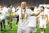 LIFE-CHANGING: Luke Ayling with the Championship trophy following Leeds United's promotion as champions under Marcelo Bielsa. Photo by Michael Regan/Getty Images.