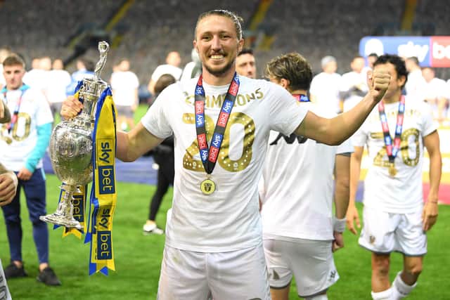LIFE-CHANGING: Luke Ayling with the Championship trophy following Leeds United's promotion as champions under Marcelo Bielsa. Photo by Michael Regan/Getty Images.