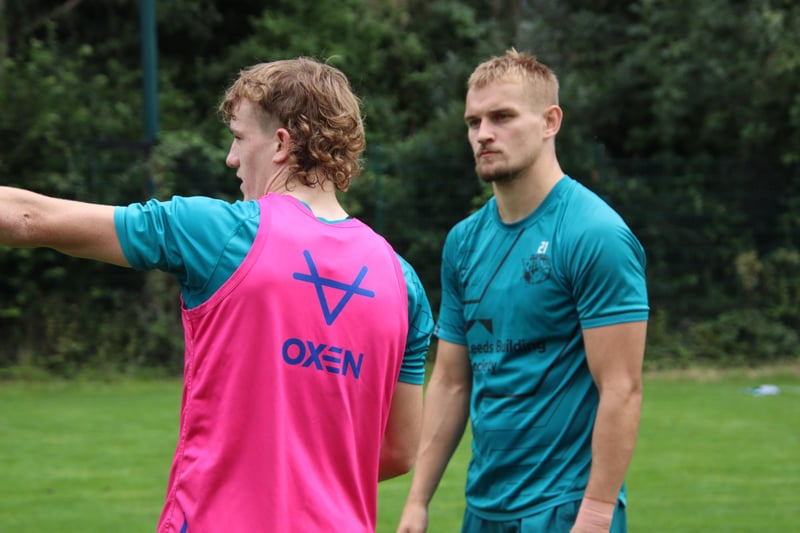 Luke Hooley, right, listens as Fergus McCormack, a 17-year-old academy-qualified half-back who is on a full-time contract, gets his point across.