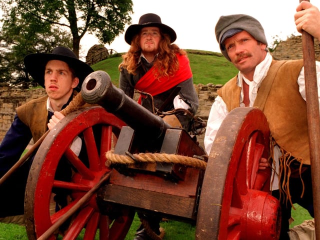 Ready for action at Pontefract Castle in August 1997 are some of the members of the Sir John Belasyse Regiment of Foot of The Sealed Knot. They were taking part in a Civil War Day at the Castle. Pictured, from left, are Paul Matthews, Darren Mahon and Des Pearce.