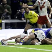 Jon Bennison reaches out in an attempt to score against Leeds. (Photo: Allan McKenzie/SWpix.com)