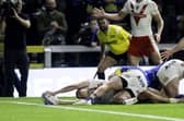 Jon Bennison reaches out in an attempt to score against Leeds. (Photo: Allan McKenzie/SWpix.com)
