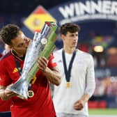 AIMING HIGH: Leeds United striker Rodrigo kisses the Nations League trophy after his side's defeat of Croatia in the final. Photo by Lars Baron/Getty Images.