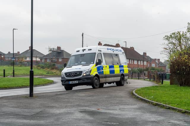 A police van in Halton Moor as officers patrolled the area around Kendal Drive in the days following the violent disorder. Picture: James Hardisty