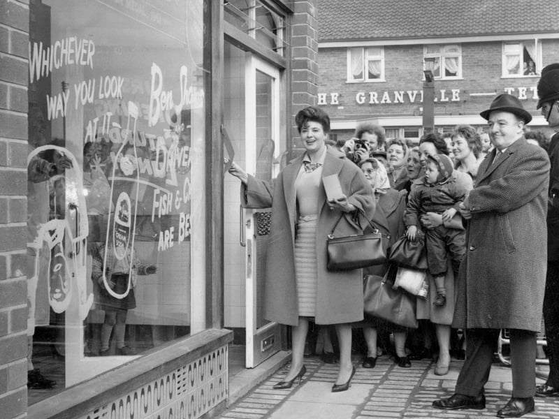 Actress Pat Phoenix, who played Elsie Tanner in Coronation Street, officially opens Lincoln Green Shopping Centre in November 1962.  The old streets of Newtown had been largely replaced with the Lincoln Green estate. The Granville public house on Lincoln Road can be seen in the background.