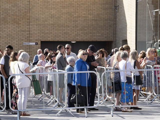 Shoppers queued up to be the first to enter the new M&S megastore at the White Rose shopping centre