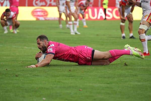 Aidan Sezer touches down for Rhinos' golden-point winning try at Catalans Dragons. Picture by Manuel Blondeau/SWpix.com.
