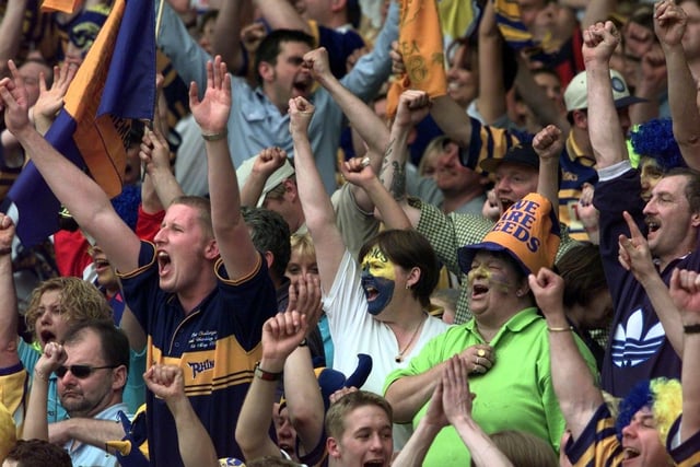 Rhinos fans celebrate their team's victory at Wembley.