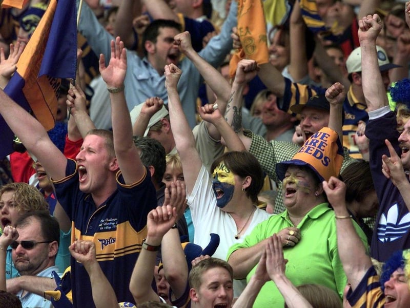 Rhinos fans celebrate their team's victory at Wembley.