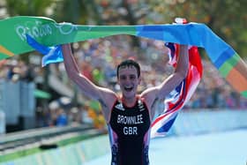 The best: Clutching a White Rose flag and a union jack, Alistair Brownlee of Great Britain wins gold at the Rio Olympics (Picture: Alex Livesey/Getty Images)