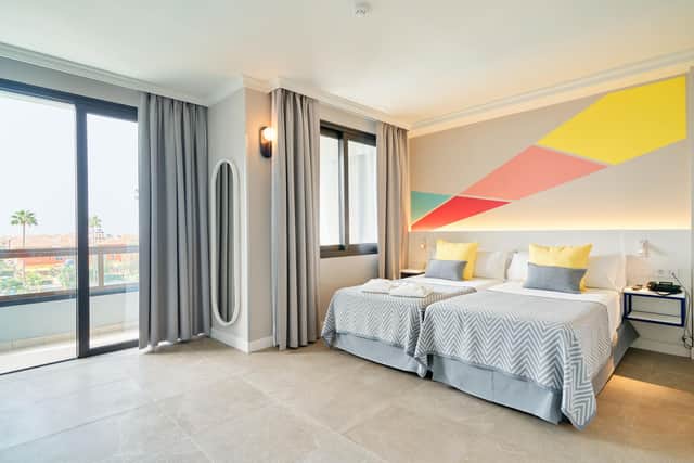 Spring Hotel Bitácora's beautiful bedrooms blend bright décor with balconies offering amazing pool and sea views