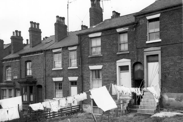 Highfield Terrace in July 1964. Between number 17 and number 19 is a passageway through to Highfield Street. At this side there is a path between the gardens which exits on Back West View.