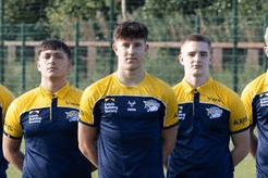 Jacob Hardy, middle, seen in 2024 when he stepped up to Rhinos' academy from the under-16s. He is flanked by Harvey Butterworth and Tom Richardson. Picture by Dan Hawkhead/Leeds Rhinos.