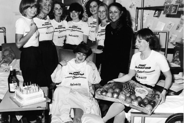 Joining in the 21st birthday fun at YEP classified department in January 1982 are, from front: Debbie Carroll and Carol Gay (with fruit). From left are Brenda Jackson, Karen Wilson, Julie Shawmarsh, Sally Moore, Carol Clay, June Ratcliffe and Paula Bamford.