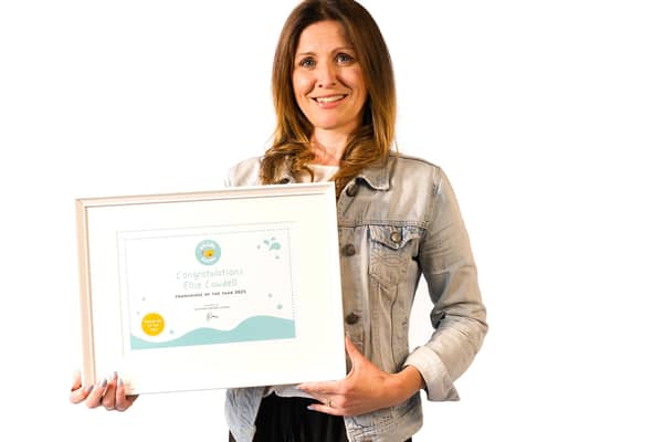 Ellie Cawdell accepting her award at Puddle Ducks Conference in 2025