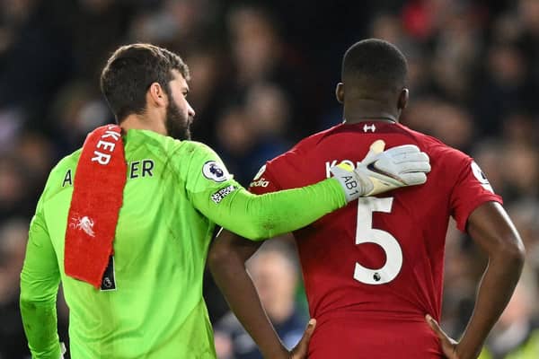 Liverpool pair Alisson and Ibrahima Konate have missed training this week, according to manager Jurgen Klopp (Photo by GLYN KIRK/AFP via Getty Images)