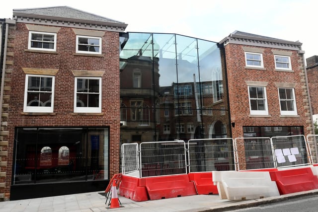 The restoration now includes a complete reinstatement of the original West Wing, which was lost during demolition in 2010. There is also a top-lit atrium in place of the former central courtyard, and a new circulation core on the building’s southern elevation to create a visual link to Leeds’ Crown Square and Corn Exchange.