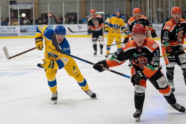 GONNA GET YA: Forward Zach Brooks chases down former Leeds Knights' defenceman Ross Kennedy (right) during Saturday night's NIHL National clash at Elland Road Ice Arena. Picture courtesy of Oliver Portamento