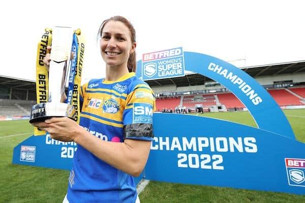 Rhinos captain Courtney Winfield-Hill shows off the Women's Super League trophy following Sunday's win over York, a result which delighted kruise Leemuing. Picture by John Clifton/SWpix.com.