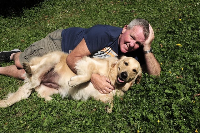 Man's best friend - Jim Hurst and his dog Ruby relaxing in the grounds at Lotherton Hall.