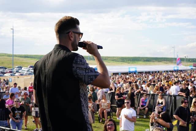 Swain entertaining the masses at one of many festivals he presents across the country.