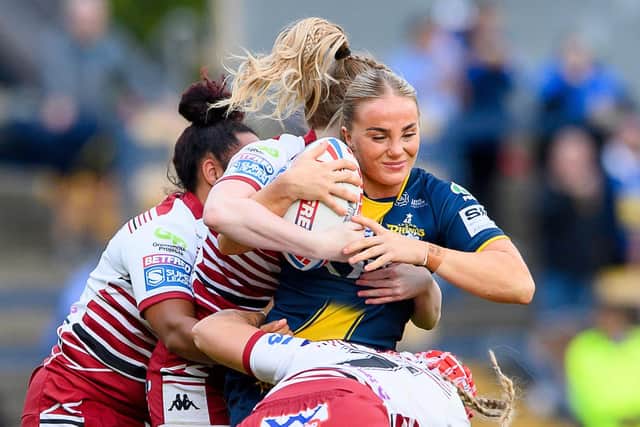 Leeds Rhinos' Lucy Murray is tackled during the defeat by Wigan Warriors last week. Picture by Allan McKenzie/SWpix.com.