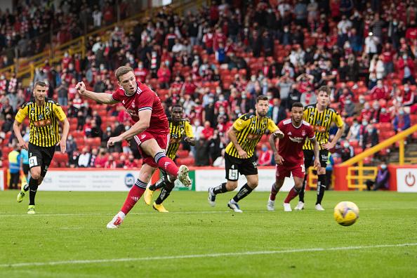 Total squad value: £16.56 million, MVP: Lewis Ferguson, Average age: 26.6, Foreign players: 15