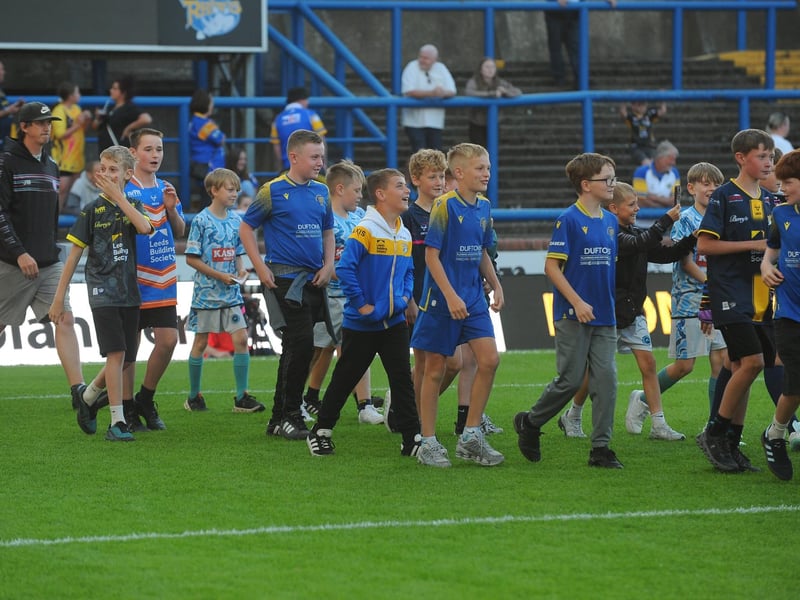 Rhinos flag wavers take to the hallowed turf at AMT Headingley.