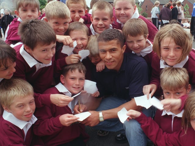 Rugby star Jason Robinson signs autographs at his old school in Hunslet Carr in June 1998.