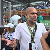 CRUNCH TIME: In determining the strength of a Leeds United 'advantage' against Manchester City and their boss Pep Guardiola, above, pictured on the grid ahead of last month's Abu Dhabi Formula One Grand Prix at the Yas Marina Circuit in the Emirati city of Abu Dhabi. Photo by BEN STANSALL/AFP via Getty Images.