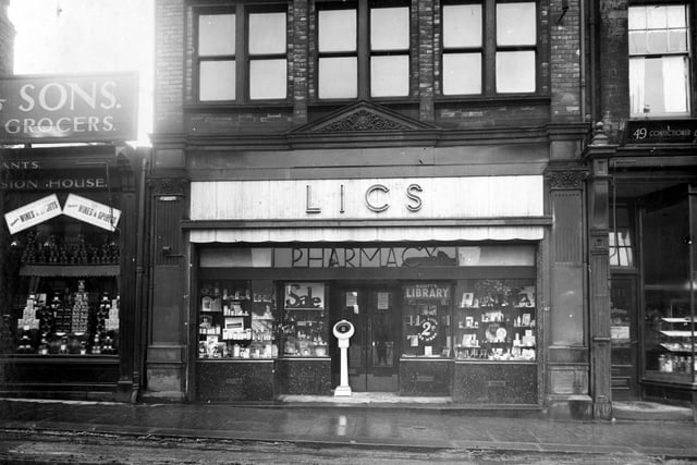 The Leeds Industrial Society store on Otley Road in January 1936. On the left is J.F. Rhodes & Sons, grocers with Megson's bakery on the right.