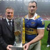 Chief executive Gary Hetherington with star player Jamie Peacock after Leeds Rhinos retained the Super League trophy at Old Trafford in 2008. Picture by Steve Riding.