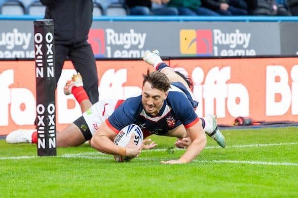 Matty Ashton scores the opening try for England against Tonga. Picture by Allan McKenzie/SWpix.com.