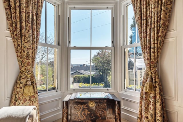 The living room looks out onto the front garden with views over Wetherby.