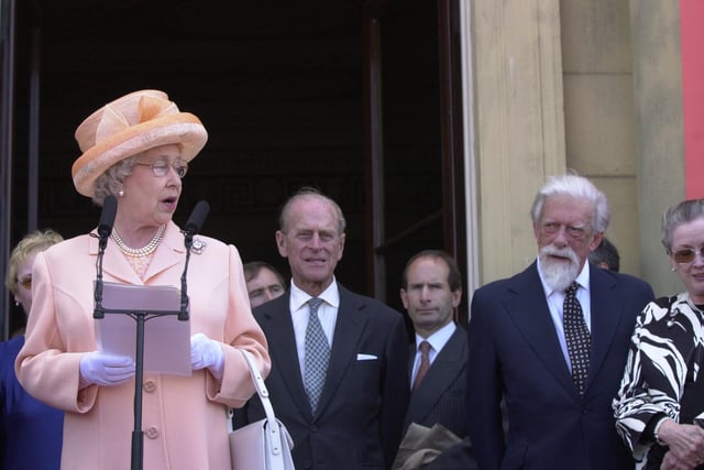 The Queen makes a speech on the steps of Harewood House watched by the Duke of Edinburgh and the Earl and Countess of Harewood.