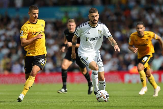 LEEDS, ENGLAND - AUGUST 06:  Mateusz Klich of Leeds United runs with the ball during the Premier League match between Leeds United and Wolverhampton Wanderers at Elland Road on August 06, 2022 in Leeds, England. (Photo by David Rogers/Getty Images)