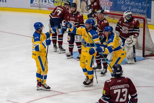 GOOD START: Grant Cooper (centre) has made good first impressions both on and off the ice since joining Leeds Knights. Picture: Oliver Portamento.