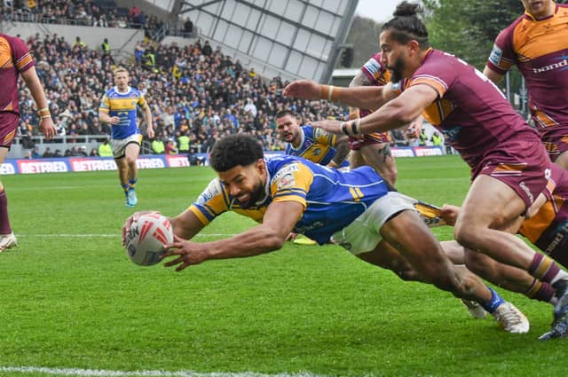 Kallum Watkins scores in Leeds Rhinos' home win against Huddersfield Giants at Easter. Picture by David Harrison.
