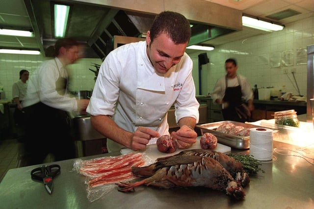 Inside city centre restaurant Rascasse. Pictured is chef Simon Gueller working on his Roast Partridge Pancetta with fresh thyme.